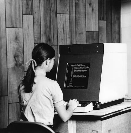 A student uses a PLATO terminal