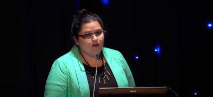 Margaret Huettl speaking at the Why Go to the Moon_ event, held at the Adler Planetarium on July 19, 2019